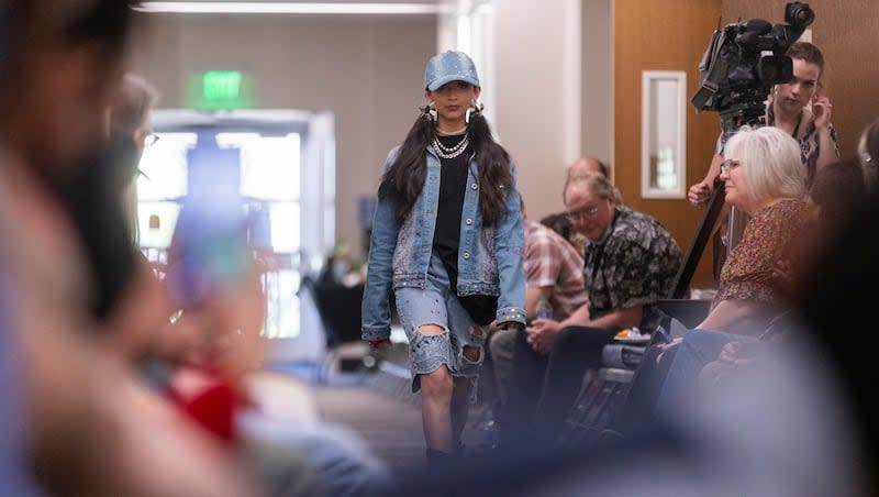 Ashley models Diana Magdiel Bedolla’s recycled, upcycled and repurposed clothing at the first-ever SLCC Trashion Show at the SLCC Fashion Institute in Salt Lake City on Monday, April 22, 2024.