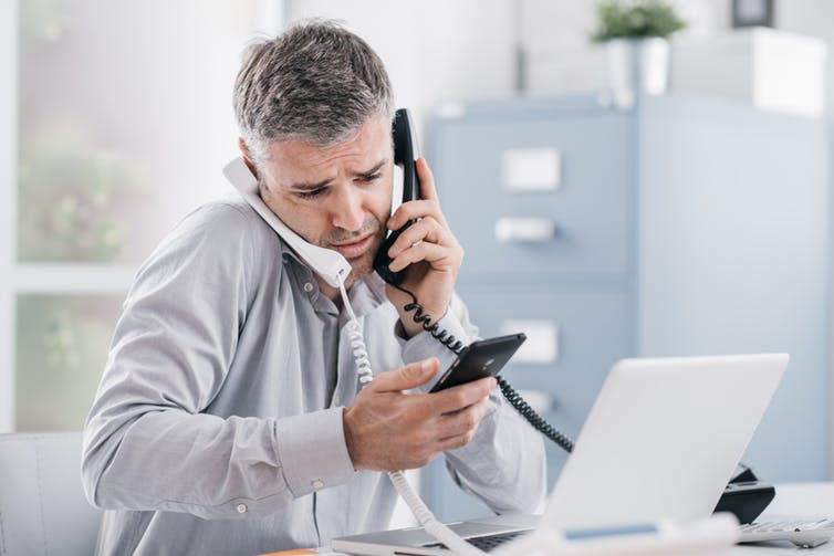 <span class="caption">Multitasking: gig economy work can be stressful.</span> <span class="attribution"><a class="link " href="https://www.shutterstock.com/image-photo/stressed-desperate-businessman-working-his-office-778064218?src=937a1c6b-628b-4d69-ae8e-b3aee1f72020-1-0" rel="nofollow noopener" target="_blank" data-ylk="slk:Shutterstock;elm:context_link;itc:0;sec:content-canvas">Shutterstock</a></span>