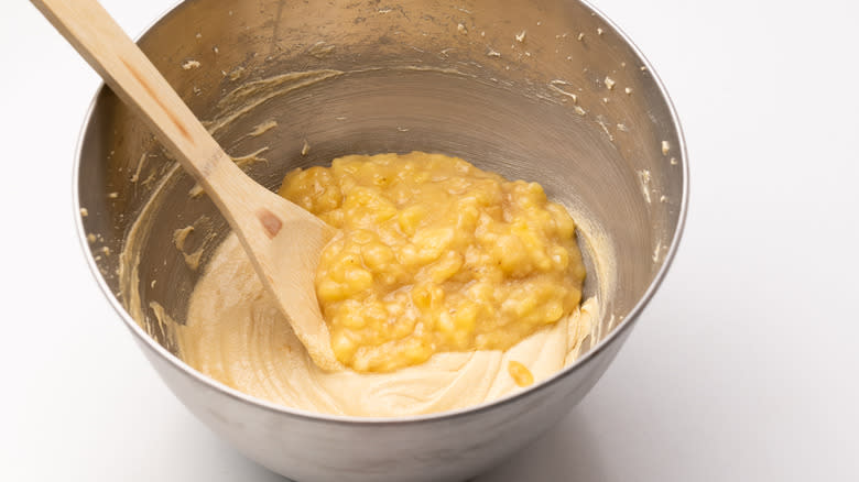 Mixing banana bread batter