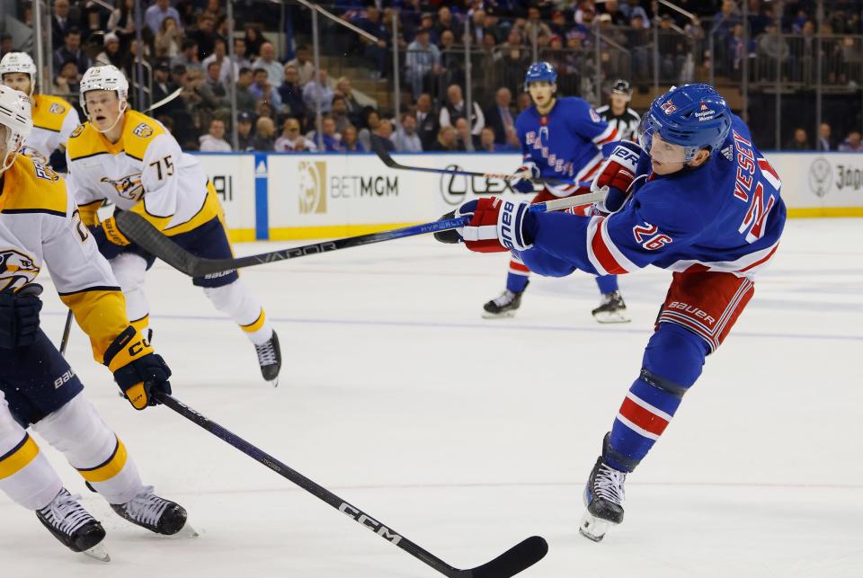 NEW YORK, NEW YORK - OCTOBER 19: Jimmy Vesey #26 of the New York Rangers takes the second period shot against the Nashville Predators at Madison Square Garden on October 19, 2023 in New York City.