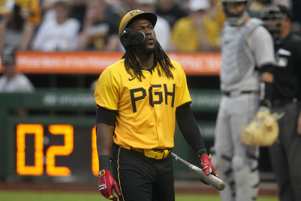 Pittsburgh Pirates' Oneil Cruz walks back to the dugout after striking out during the second inning of a baseball against Colorado Rockies starting pitcher Cal Quantrill in Pittsburgh, Friday, May 3, 2024. (AP Photo/Gene J. Puskar)