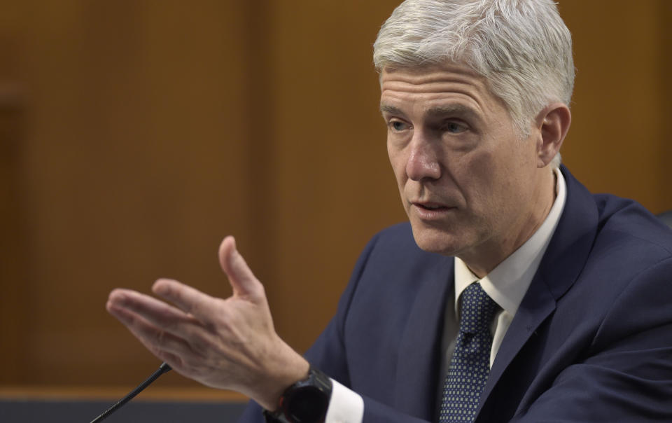 FILE - Supreme Court Justice nominee Neil Gorsuch testifies on Capitol Hill in Washington, March 22, 2017, during his confirmation hearing before the Senate Judiciary Committee. In one form or another, every Supreme Court nominee is asked during Senate hearings about his or her views of the landmark abortion rights ruling that has stood for a half century. Now, a draft opinion obtained by Politico suggests that a majority of the court is prepared to strike down the Roe v. Wade decision from 1973, leaving it to the states to determine a woman’s ability to get an abortion. (AP Photo/Susan Walsh, File)