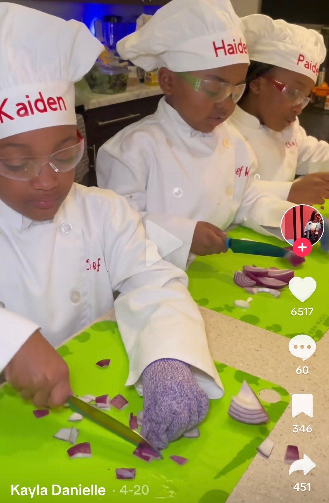 A screenshot from a TikTok of Kaiden, Haiden and Paiden Curtis cooking.