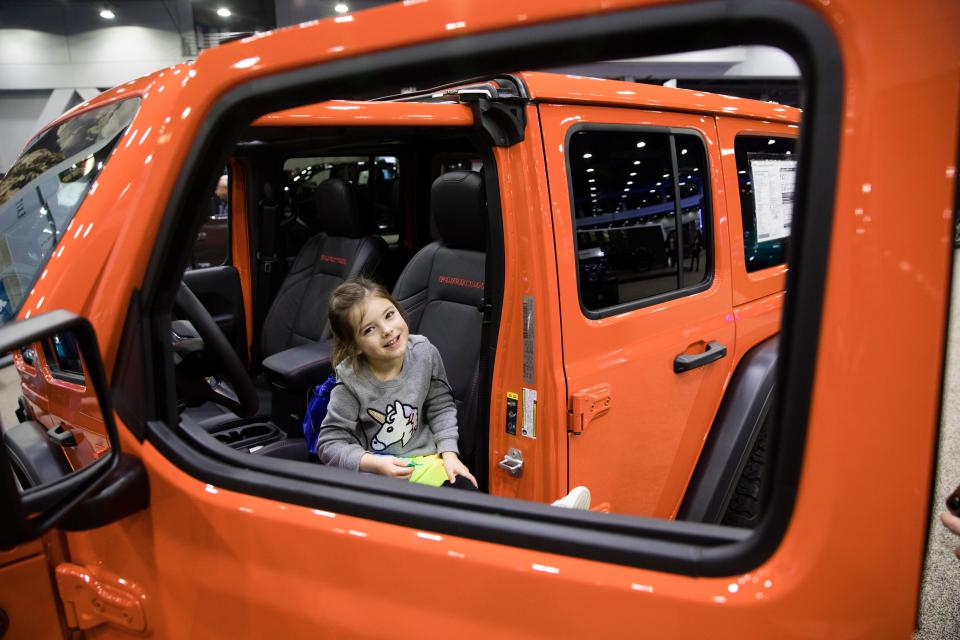 The 2024 Cincinnati Auto Expo takes place Thursday-Sunday at Duke Energy Convention Center. Pictured: Grace Johnston, 4, sits inside a 2020 Jeep Fusion at the 2020 Auto Expo.
