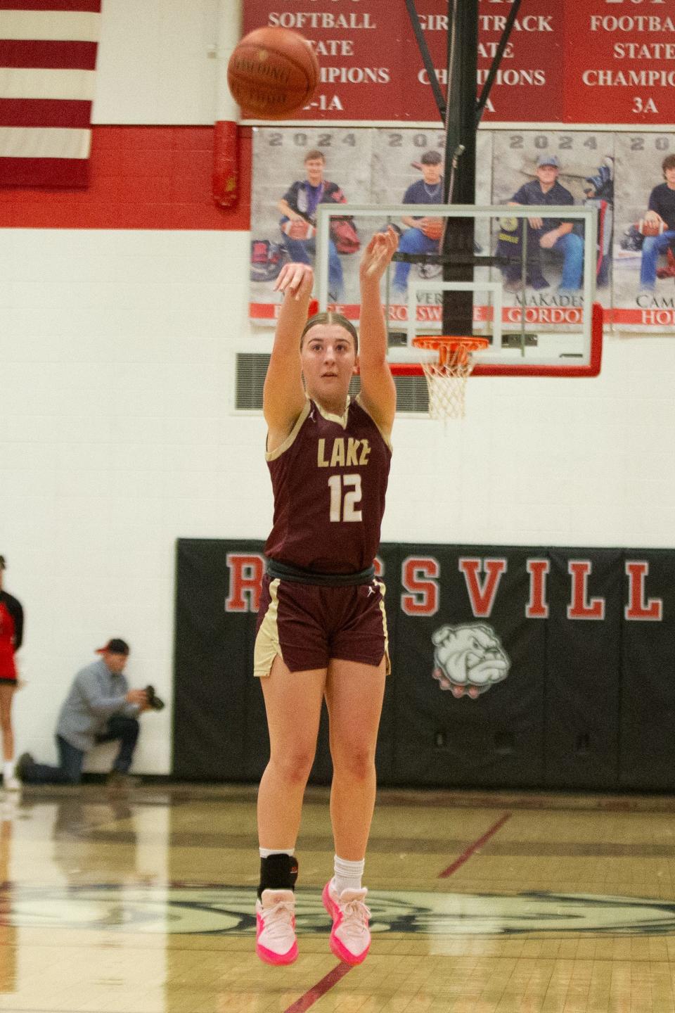 Silver Lake senior McKinley Kruger (12) shoots against Rossville in the second half of the War on 24 game Friday, February 9, 2024, inside Rossville High School.