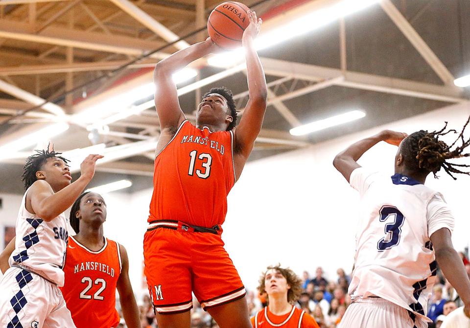 Mansfield Senior High School's Kyevi Roane (13) shoots against Sandusky High School during their Division II district semifinal high school boys basketball game at Ashland High School Thursday, March 2, 2023. TOM E. PUSKAR/NEWS JOURNAL