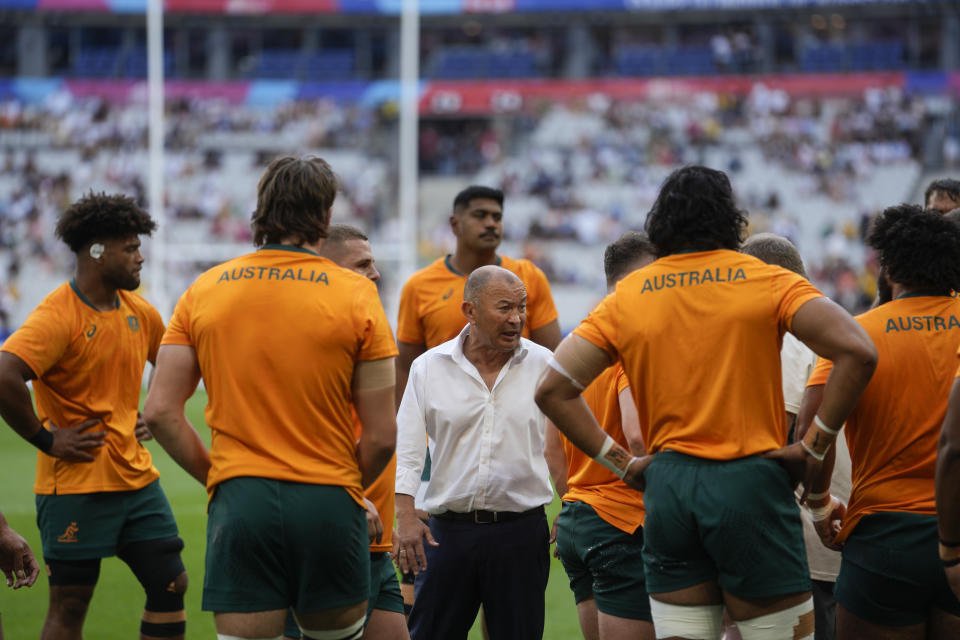 CORRECTS COACH NAME Australia's head coach Eddie Jones speaks to his squad prior to the Rugby World Cup Pool C match between Australia and Georgia at the Stade de France in Saint-Denis, north of Paris, Saturday, Sept. 9, 2023. (AP Photo/Thibault Camus)