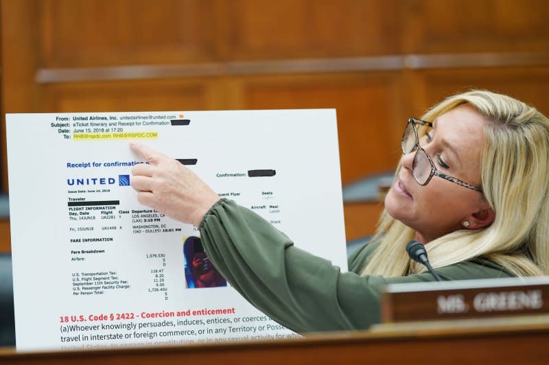 Rep. Marjorie Taylor Greene, R-Ga., uses a poster to illustrate allegations about Hunter Biden during a House Committee on Oversight and Accountability hearing at the U.S. Capitol in Washington, D.C. Photo by Bonnie Cash/UPI