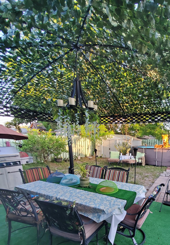 a reviewer photo of the ivy installed on a gazebo roof 