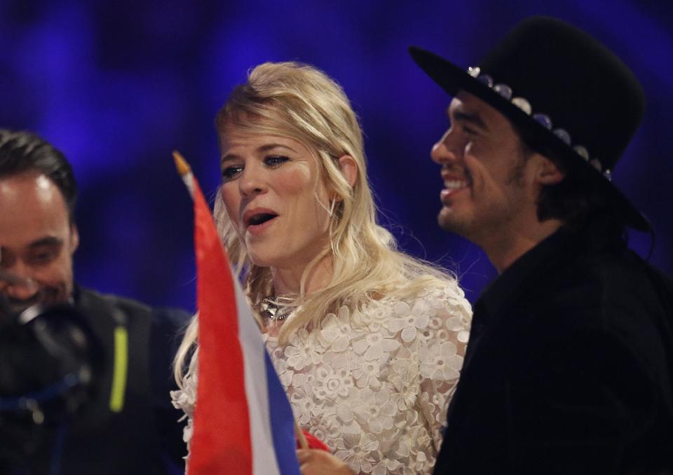 The band The Common Linnets representing The Netherlands who performed the song 'Calm After The Storm' listen as points are announced during the judging at the final of the Eurovision Song Contest in the B&W Halls in Copenhagen, Denmark, Saturday, May 10, 2014.(AP Photo/Frank Augstein)