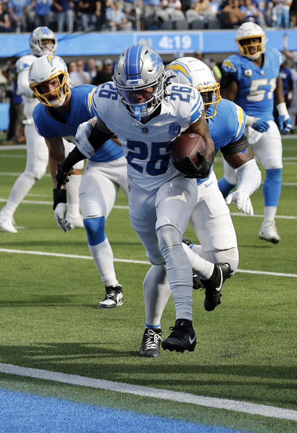 Jahmyr Gibbs of the Detroit Lions runs for a touchdown during the first quarter against the Los Angeles Chargers at SoFi Stadium on November 12, 2023 in Inglewood, California.