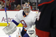 New York Islanders goaltender Semyon Varlamov (40) watches the puck against the Carolina Hurricanes during the second period in Game 1 of an NHL hockey Stanley Cup first-round playoff series in Raleigh, N.C., Saturday, April 20, 2024. (AP Photo/Karl B DeBlaker)