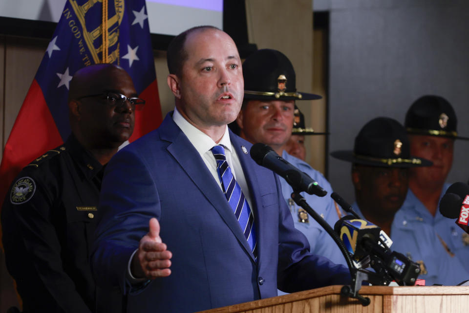 FILE - Georgia Attorney General Chris Carr speaks during a news conference, Sept. 5, 2023, at the Georgia Department of Public Safety in Atlanta. Georgia's attorney general says city officials in Savannah, Ga., overstepped their authority by making it illegal to leave firearms in unlocked cars. (Natrice Miller/Atlanta Journal-Constitution via AP, File)