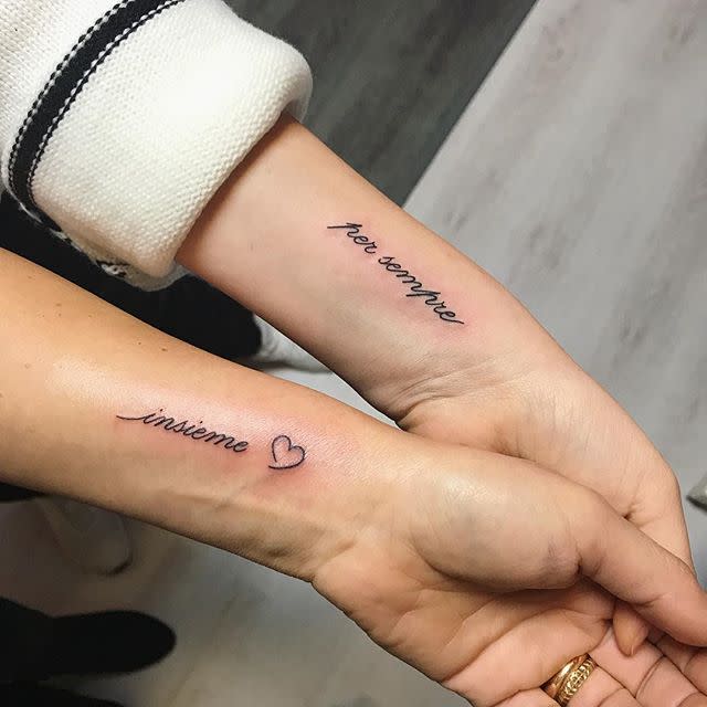 14) This Mother-Daughter Script Tattoo