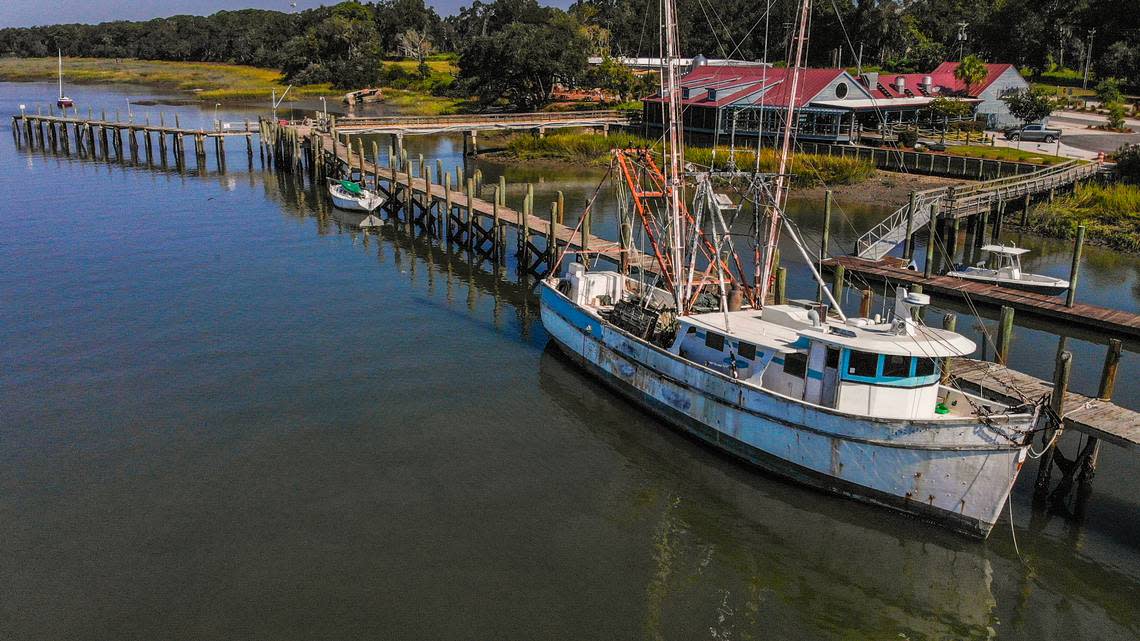 A sailboat and a shrimp boat, pictured here on Sept. 21, 2022, still must be removed from the pier in Battery Creek before the Town of Port Royal can build a new pier at the end of 11th Street in Port Royal.