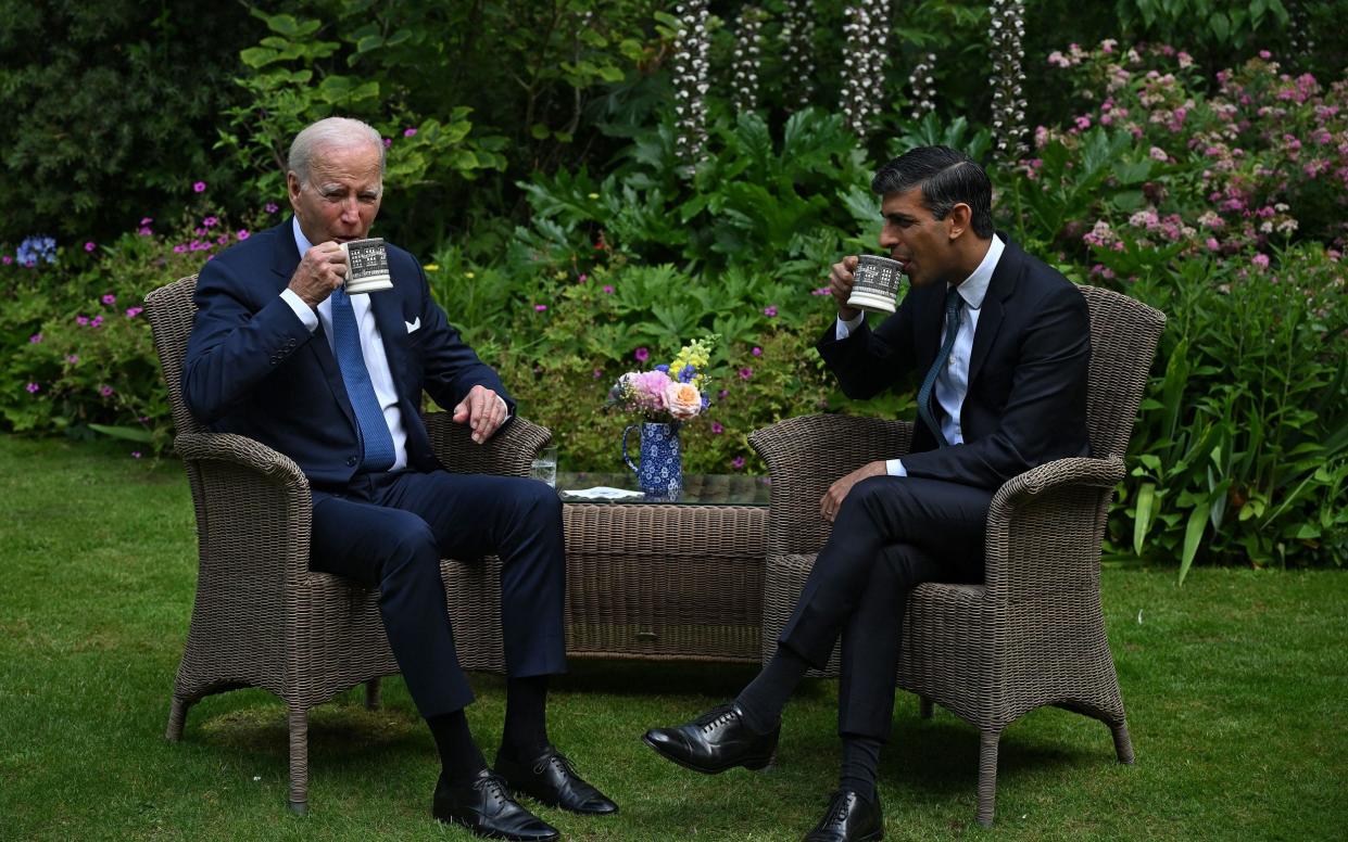 Sunak and Joe Biden sitting in the garden of 10 Downing Street in July 2023