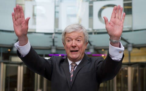 Lord Hall gestures as he arrives for his first day as director-general of the BBC at New Broadcasting House in central London on April 2, 2013 - Credit: AFP