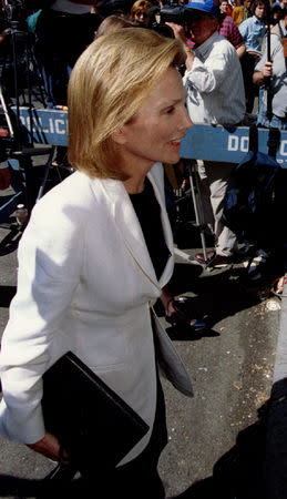 FILE PHOTO -- Lee RadzIwill Ross arrives at the apartment of her late sister Jacqueline Kennedy Onassis before the start of a private prayer service May 22, 1994. REUTERS/Jim Bourg/File Photo