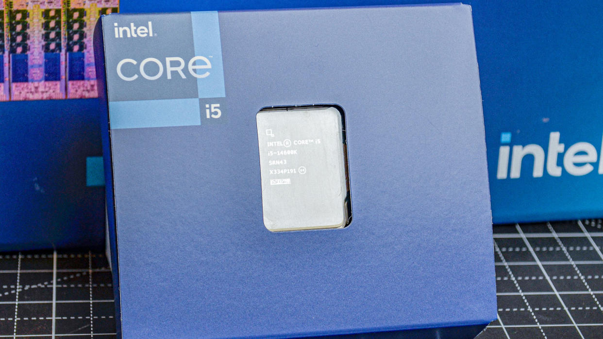  An Intel Core i5-14600K against its promotional packaging. 