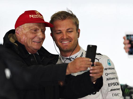 Niki Lauda takes a selfie with Nico Rosberg (Getty)