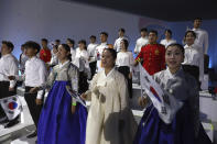 South Koreans perform during the celebration of 75th anniversary of the Liberation Day at Dongdaemun Design Plaza in Seoul Saturday, Aug. 15, 2020. South Korea marked its 75th National Liberation Day on Saturday, which celebrates its independence from Japanese colonial rule following the end of World War II after Japan surrendered. (Chung Sung-jun/Pool Photo via AP)