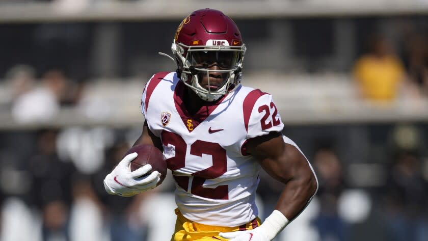 Southern California running back Darwin Barlow (22) in the first half of an NCAA college football game Saturday, Oct. 2, 2021, in Boulder, Colo. (AP Photo/David Zalubowski)