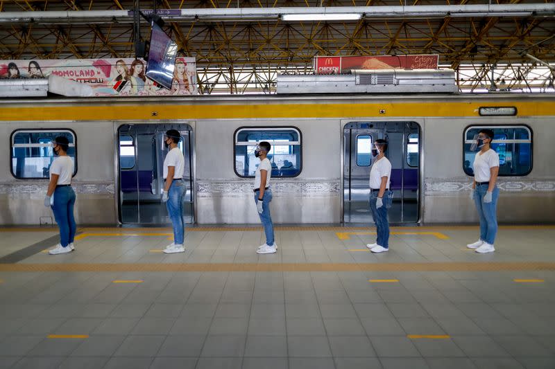 Philippines' police test runs new social distancing rules on public trains in the capital