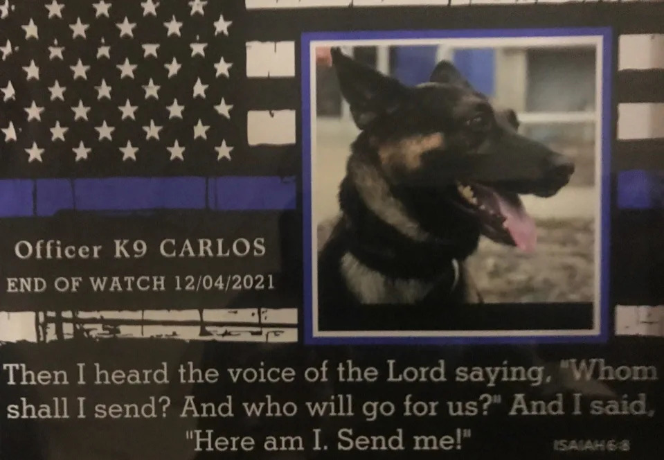 An End of Watch memorial plaque in honor of the recently deceased retired Vineland police K9 Carlos was given to his former partner and post-career owner Officer Dwight Adams. The dog&#39;s passing was remembered at a short ceremony at the City Council meeting Tuesday night. Jan. 25, 2022.