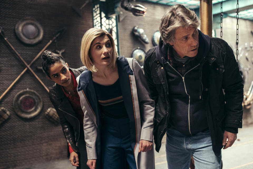 WARNING: Embargoed for publication until 00:00:01 on 09/10/2021 - Programme Name: Doctor Who S13 - TX: n/a - Episode: Doctor Who - Ep 1 (No. n/a) - Picture Shows:  Yaz (MANDIP GILL), The Doctor (JODIE WHITTAKER), Dan (JOHN BISHOP) - (C) BBC Studios - Photographer: James Pardon