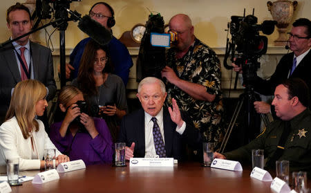 U.S. Attorney General Jeff Sessions speaks as President Donald Trump hosts a "California Sanctuary State Roundtable" at the White House in Washington, U.S., May 16, 2018. REUTERS/Kevin Lamarque