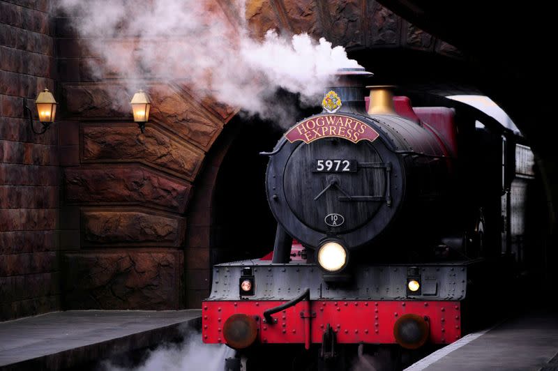 FILE PHOTO: The Hogwarts Express train, which connects the Universal Studios with neighboring Islands of Adventure, pulls into the Hogsmeade Station during a media preview for The Wizarding World of Harry Potter-Diagon Alley at the Universal Orlando Resort