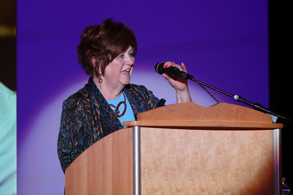 Ravenna Area Chamber of Commerce 2022 Raven Awards “Citizen of the Year” winner Anne Marie Noble speaks at the ceremony held Wednesday at Ravenna High School.