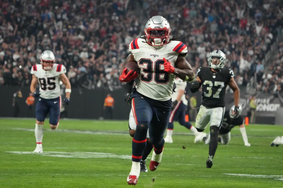 New England Patriots running back Rhamondre Stevenson (38) scores on a 34-yard touchdown run against the Las Vegas Raiders in the second half.