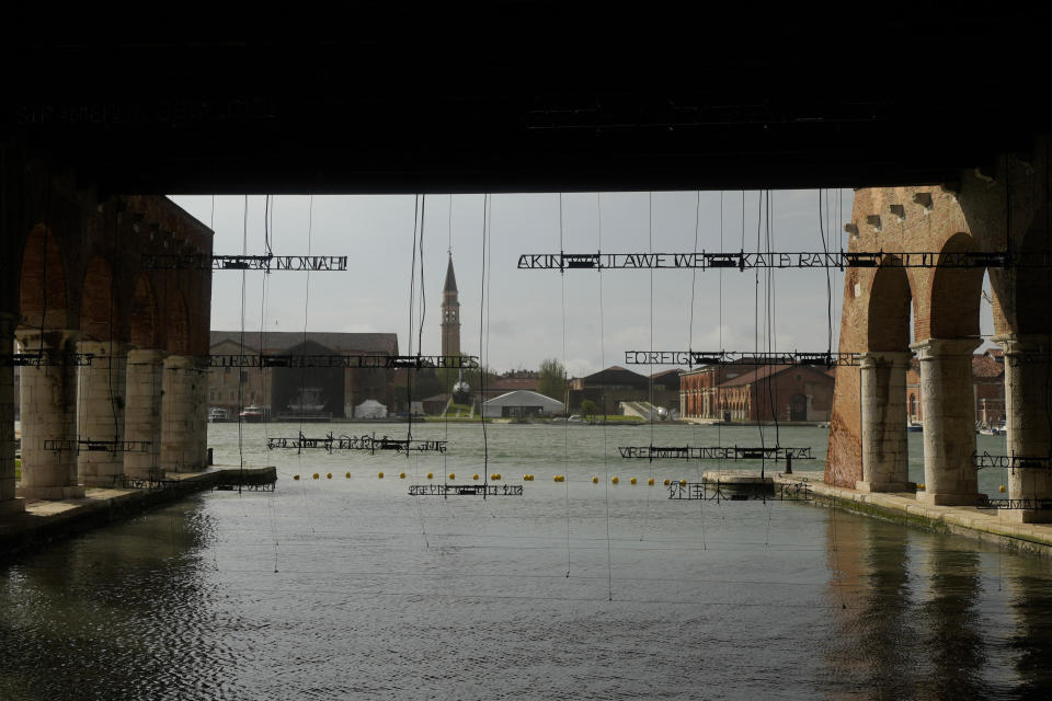 An outside view of the Arsenale during the 60th Biennale of Arts exhibition in Venice, Italy, Tuesday, April 16, 2024. The Venice Biennale contemporary art exhibition opens Saturday for its six-month run through Nov. 26. The main show titled "Stranieri Ovunque – Foreigners Everywhere," is curated for the first time by a Latin American, Brazilian Adriano Pedrosa. Pedrosa is putting a focus on underrepresented artists from the global south, along with gay and Indigenous artists. Alongside the main exhibition, 88 national pavilions fan out from the traditional venue in Venice's Giardini, to the Arsenale and other locations scattered throughout the lagoon city. (AP Photo/Luca Bruno)