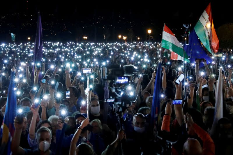 FILE PHOTO: People take part in a protest for media freedom in Budapest