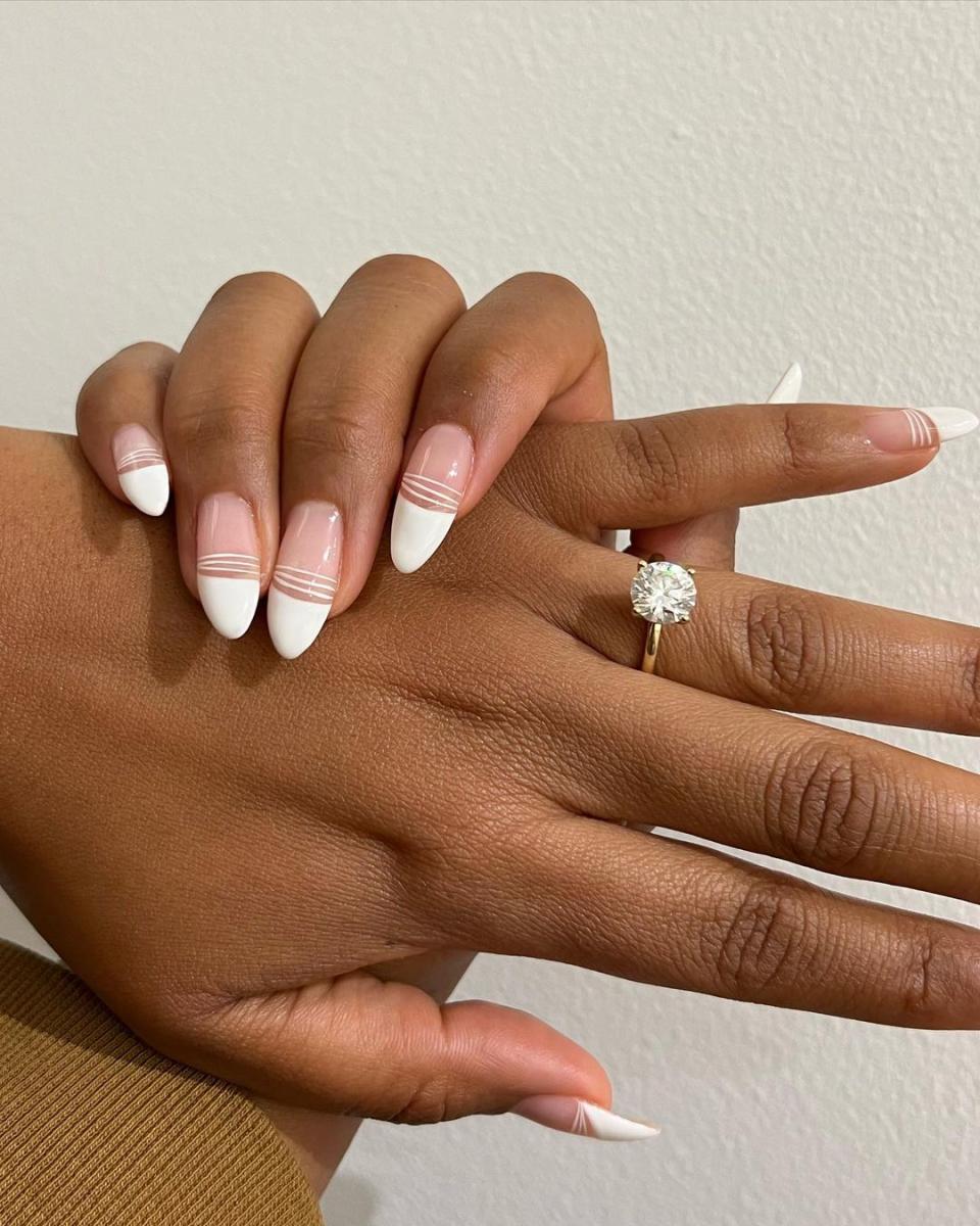 <h1 class="title">modern french manicure bridesmaid nails</h1><cite class="credit">[@nailartbyqueenie](https://www.instagram.com/p/CgR_8NJJtB3/){: target="_blank"}</cite>