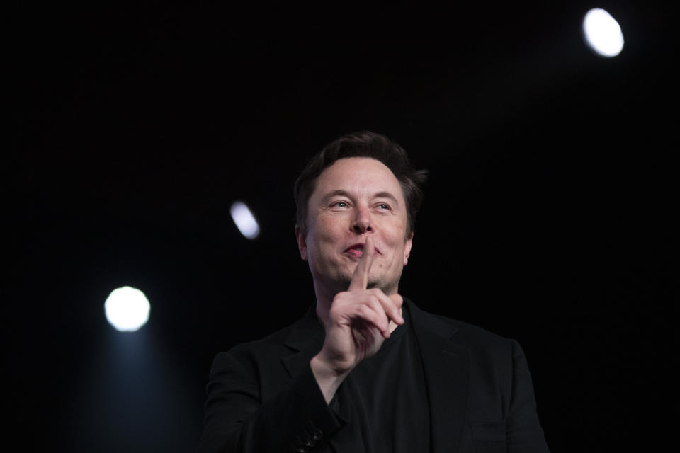 FILE- In this March 14, 2019, file photo Tesla CEO Elon Musk speaks before unveiling the Model Y at Tesla's design studio in Hawthorne, Calif. Tesla CEO Elon Musk says the electric car pioneer plans to build a new factory near Berlin. News agency dpa reported that Musk made the announcement during a prizegiving ceremony in the German capital Tuesday evening. (AP Photo/Jae C. Hong, File)