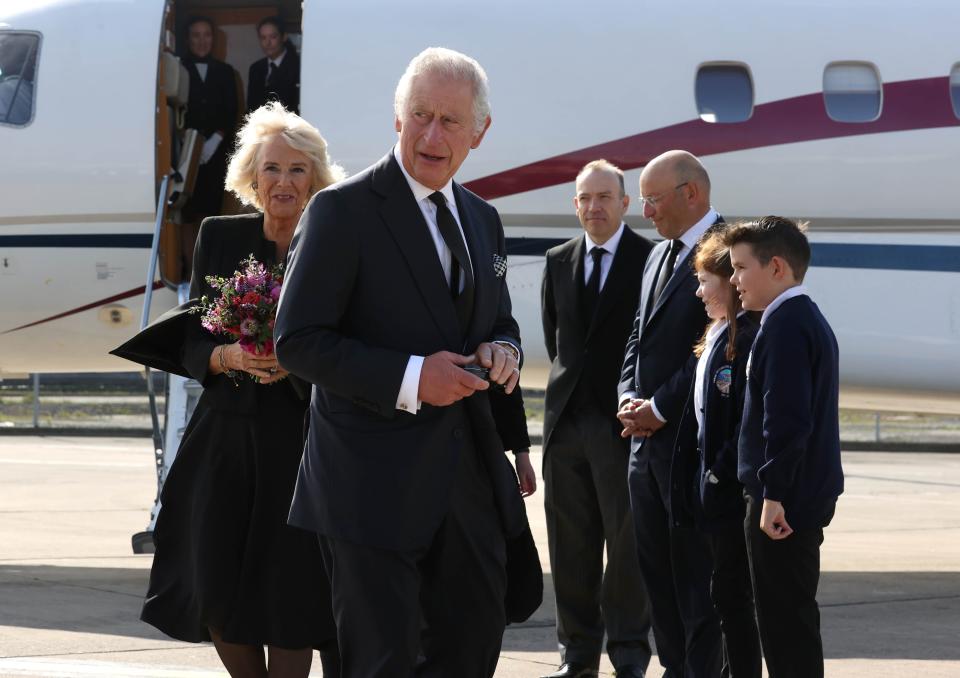 King Charles III and Camilla, Queen Consort arrive at Belfast City Airport as the King continues his tour of the four home nations on September 13, 2022 in Belfast.