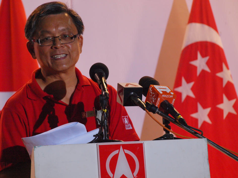 SDP candidate for Holland-Bukit Timah GRC Tan Jee Say responds to criticisms by ministers at the rally. Sunday , May 1. (Yahoo! photo/ Aeron Chew)