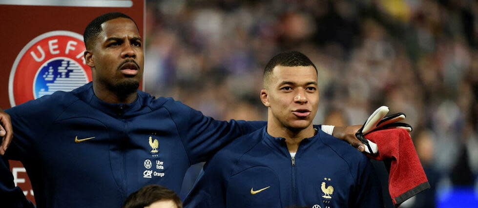 Mike Maignan et le nouveau capitaine des Bleus Kyllian Mbappé ont envoyé un signal très fort leurs des deux premiers matchs de l'Équipe de France en 2023.  - Credit:HERVIO JEAN-MARIE / KMSP / KMSP via AFP