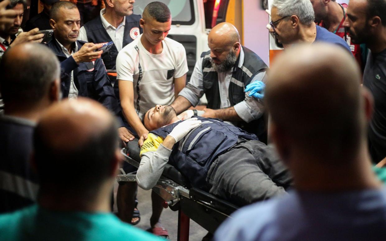 Palestinians injured during Israeli raids arrive at Nasser Hospital