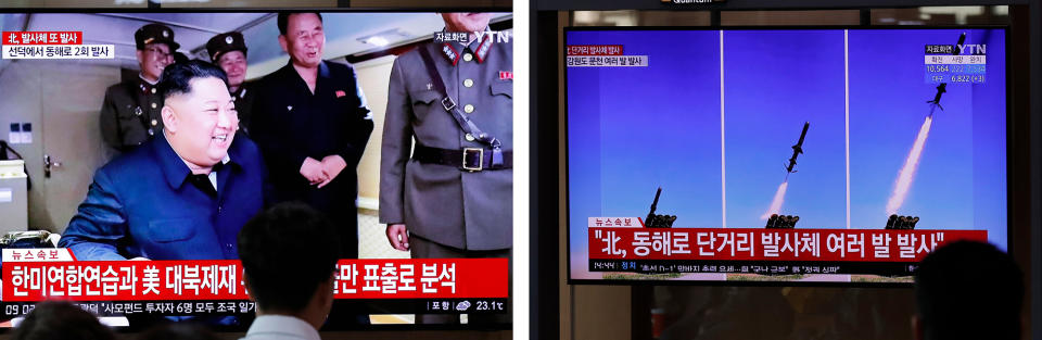 People watch a TV news program in Seoul, South Korea, reporting North Korea's firing of projectiles last August with a file image of North Korean leader Kim Jong Un.