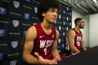 Washington State's CJ Elleby, left, and Jeff Pollard speak during the Pac-12 NCAA college basketball media day Tuesday, Oct. 8, 2019 in San Francisco. (AP Photo/D. Ross Cameron)