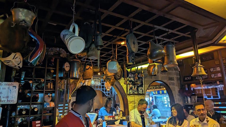 The bar, where you can humour yourself poring over every object hanging above.