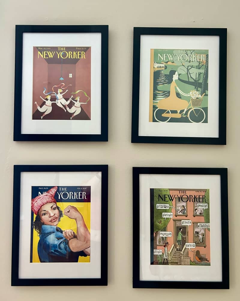 Framed covers of The New Yorker.