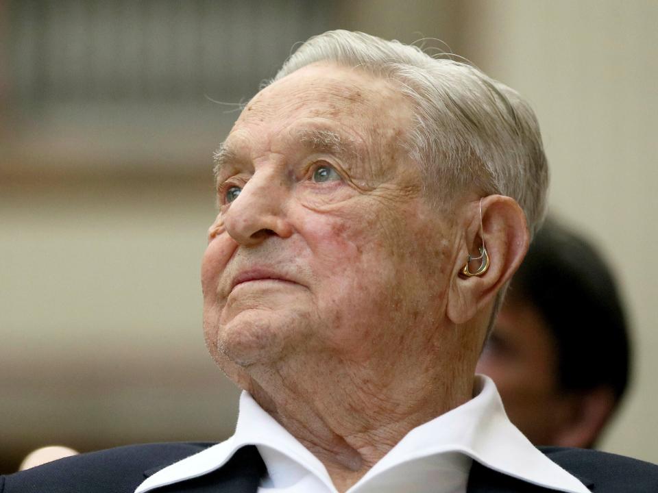 FILE - In this June 21, 2019, file photo, George Soros, Founder and Chairman of the Open Society Foundations, looks before the Joseph A. Schumpeter award ceremony in Vienna, Austria. Soros, the billionaire investor and philanthropist who has long been a target of conspiracy theories, is now being falsely accused of orchestrating and funding the protests over police killings of black people that have roiled the United States. (AP Photo/Ronald Zak, File)