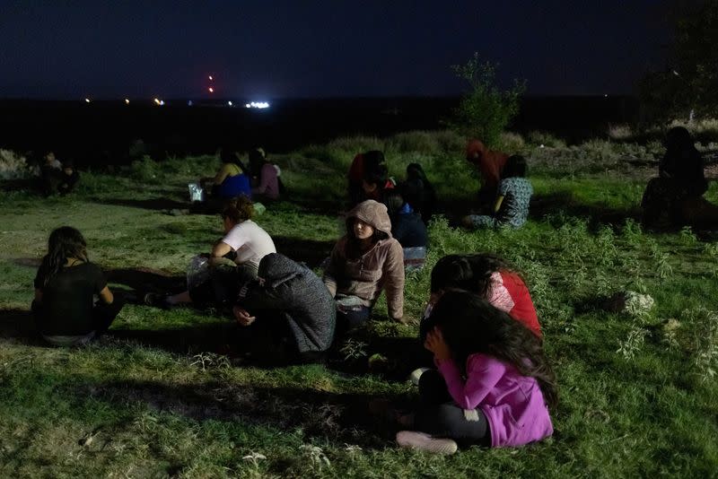 FILE PHOTO: Migrants in Roma, Texas