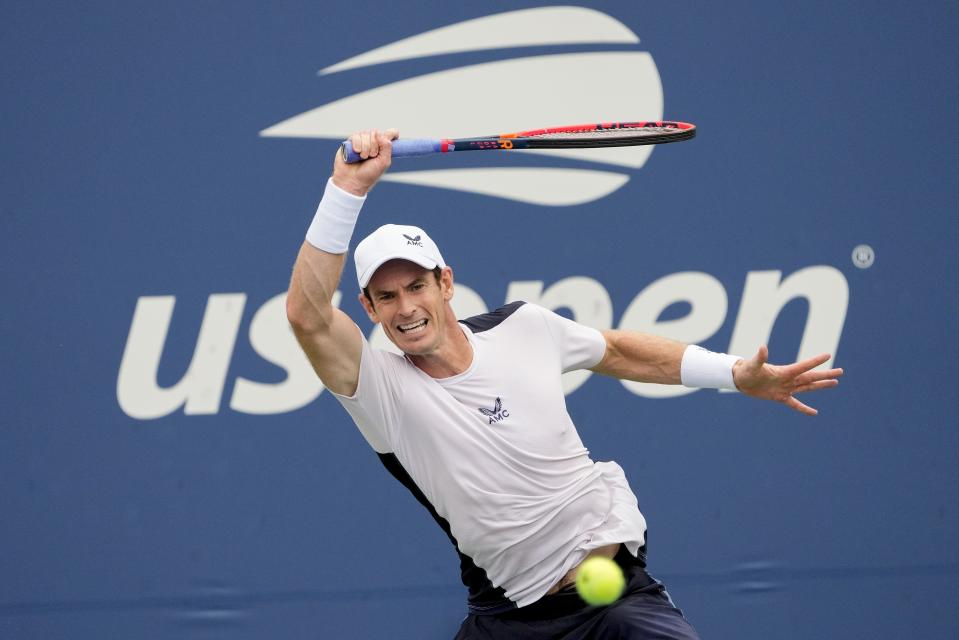 FILE - Andy Murray, of Britain, returns a shot to Corentin, Moutet, of France, during the first round of the U.S. Open tennis championships, Aug. 29, 2023, in New York. An Associated Press analysis shows the average high temperatures during the U.S. Open and the three other Grand Slam tennis tournaments steadily have grown hotter and more dangerous in recent decades. (AP Photo/Mary Altaffer, File)