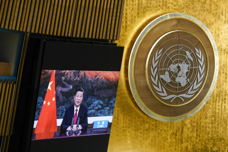 FILE - China's President Xi Jinping remotely addresses the 76th session of the United Nations General Assembly in a pre-recorded message, Tuesday Sept. 21, 2021, at UN headquarters. As world leaders gather in New York at the annual U.N. General Assembly, rising superpower China is also focusing on another United Nations body that is meeting across the Atlantic Ocean in Geneva. (AP Photo/Mary Altaffer, Pool, File)