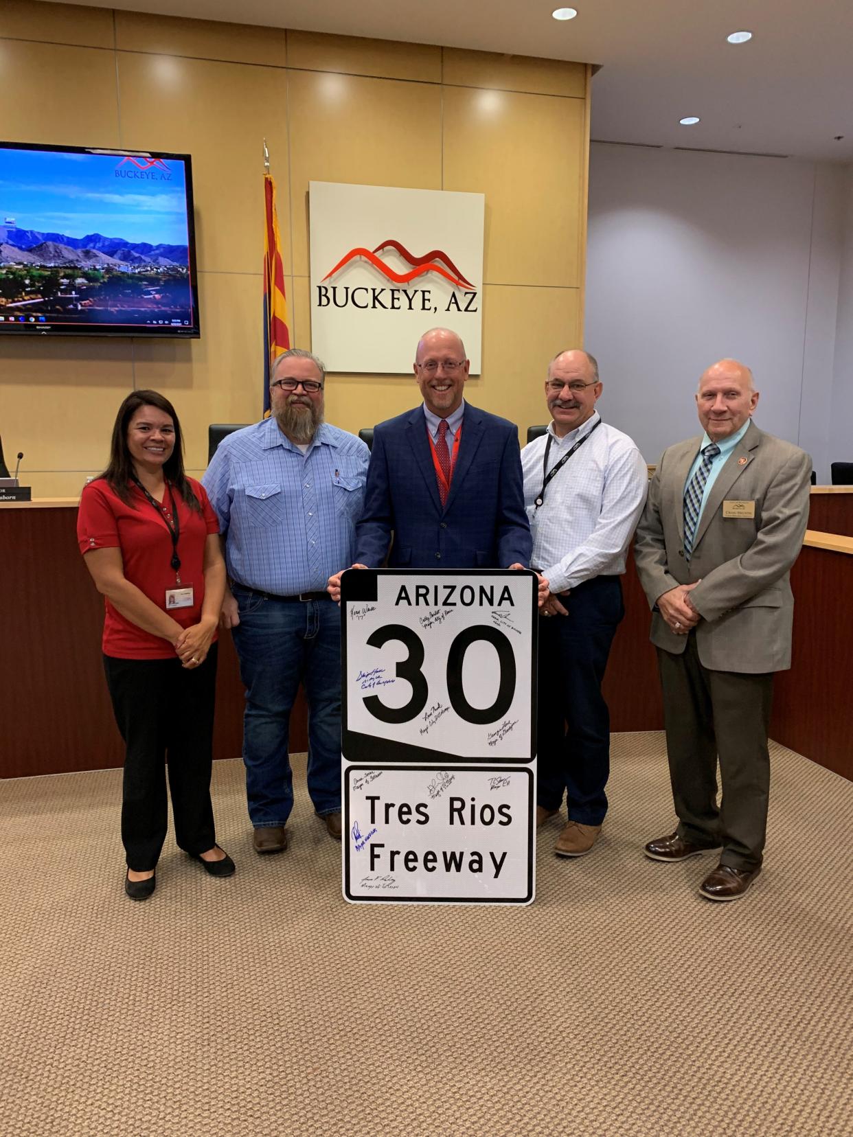 Buckeye City Council celebrates the inclusion of State Route 30 extending into Buckeye as part of the transportation tax headed to voters in 2022. From left: council members Michelle Hess and Tony Youngker, Mayor Eric Orsborn, and council members Clay Goodman and Craig Heustis.